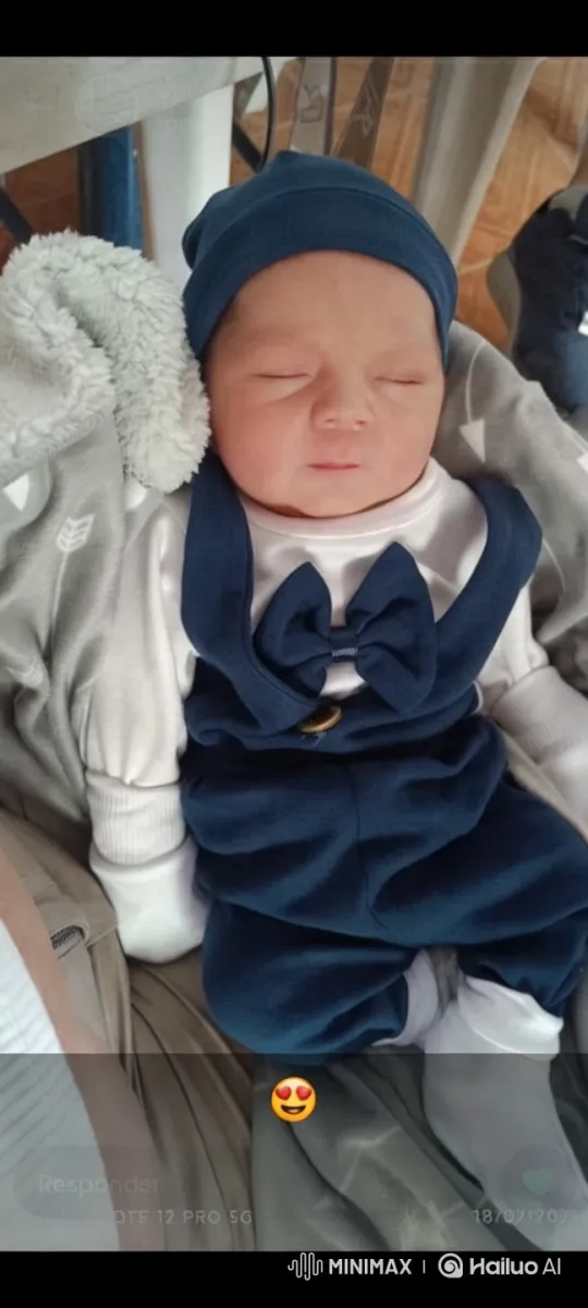 Baby in Cozy Navy Outfit on Soft Blanket – AI Generated Video | Hailuo AI