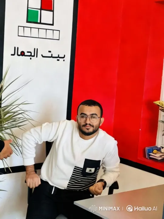 Modern Office Setting with Casual Seated Man – AI Generated Video | Hailuo AI