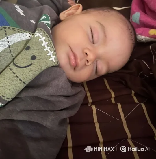 Baby Dancing Joyfully on Colorful Blankets – AI Generated Video | Hailuo AI