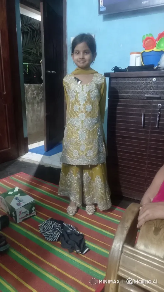 Young Girl Showcases Traditional Outfit in Colorful Room – AI Generated Video | Hailuo AI