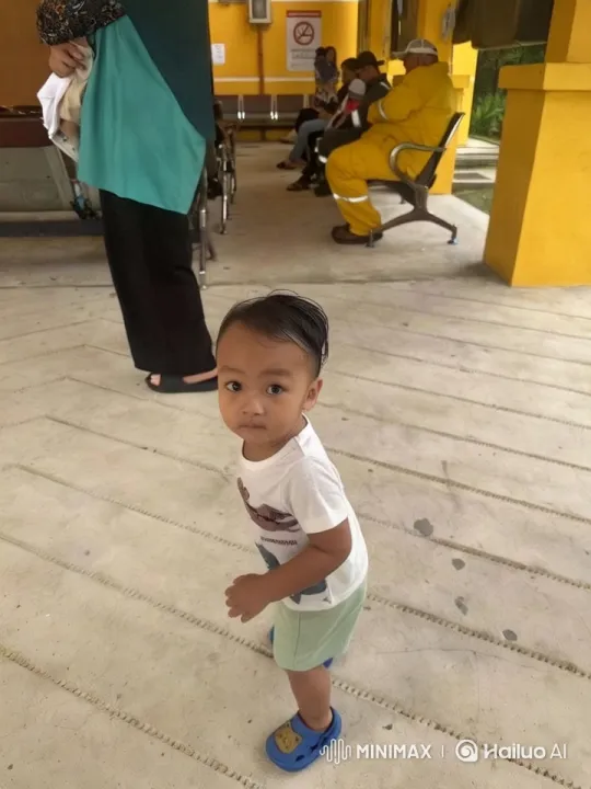Child's Joyful Dance in Yellow Building Setting – AI Generated Video | Hailuo AI