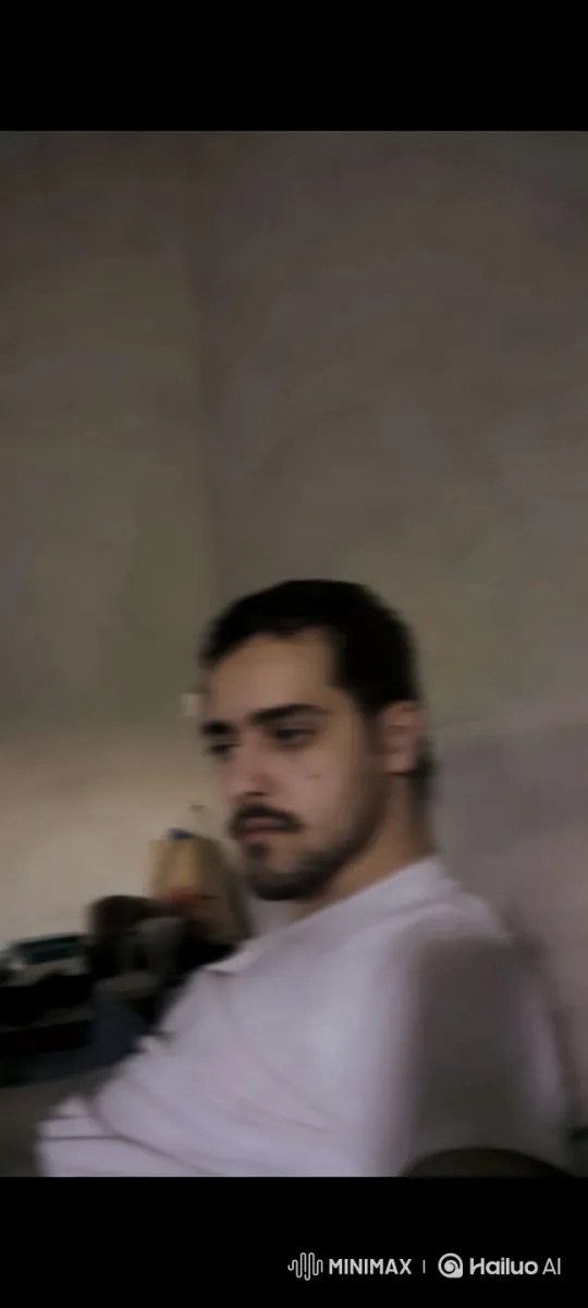 Minimalist Aesthetic: Man Smoking in Dim Light – AI Generated Video | Hailuo AI