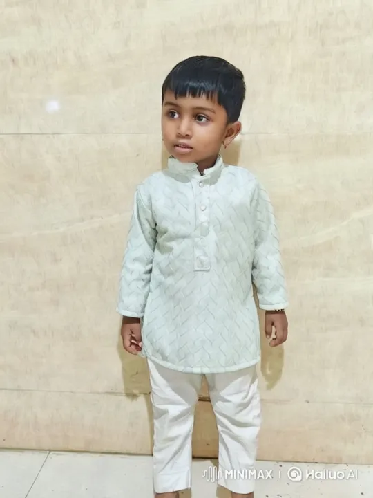 Boy in Kurta Showcases Style with Elegant Walk – AI Generated Video | Hailuo AI