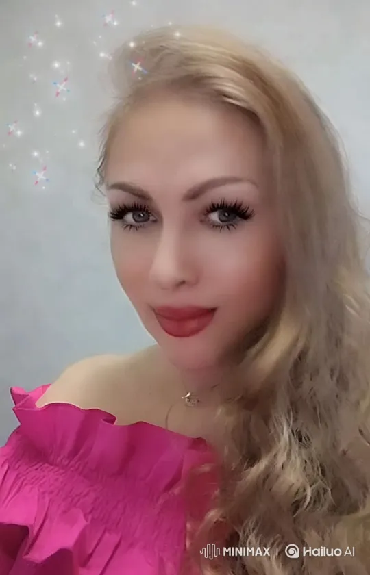 Close-up of Elegant Woman in Pink Top and Sparkling Background – AI Generated Video | Hailuo AI