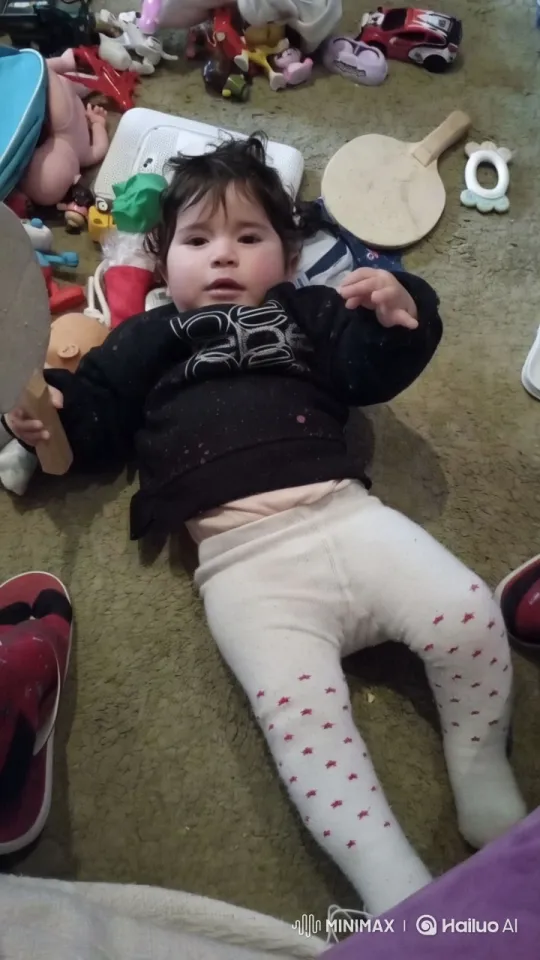 Child's Playful Moment in a Colorful Toy-Filled Space – AI Generated Video | Hailuo AI