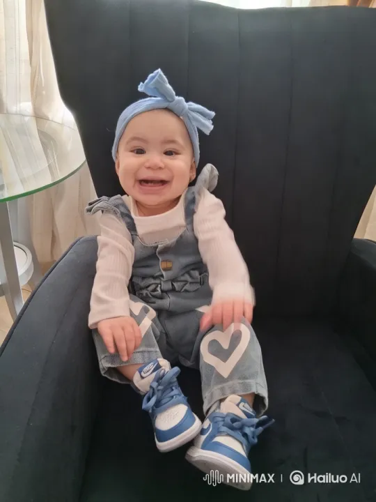 Baby in Stylish Outfit in Cozy Modern Setting – AI Generated Video | Hailuo AI