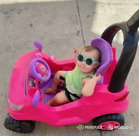 Child Enjoys Toy Car Ride in Vibrant Scene – AI Generated Video | Hailuo AI