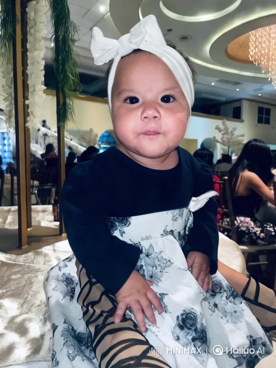 Baby in White Dress Dances at Elegant Event – AI Generated Video | Hailuo AI