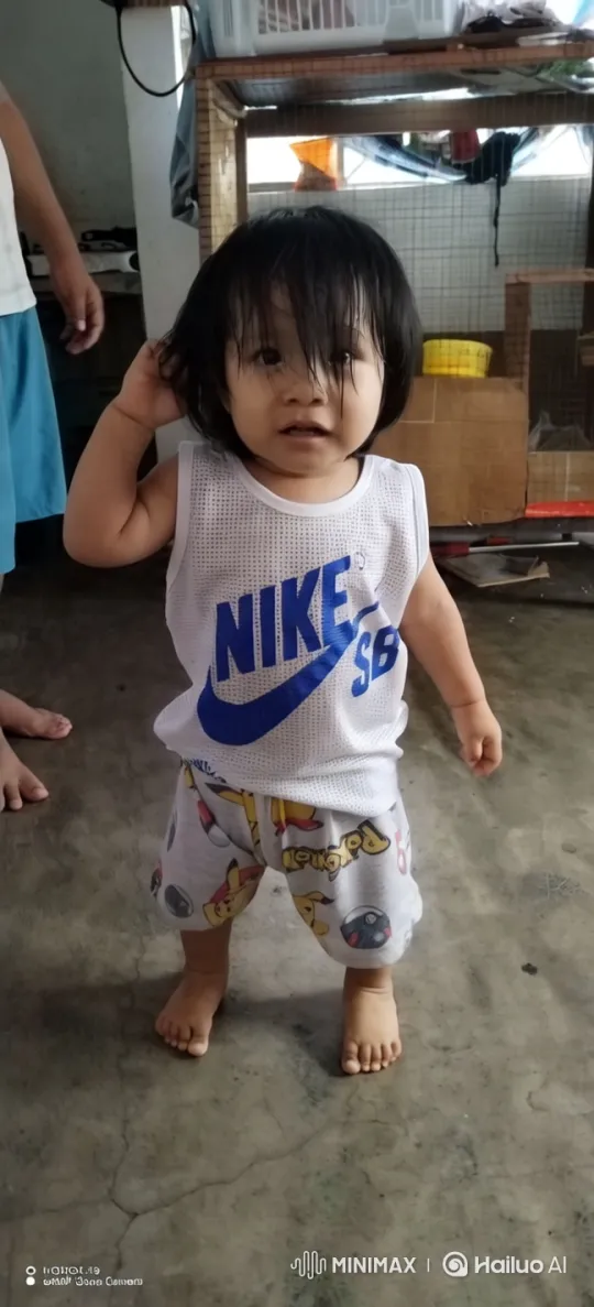 Child's Playful Kung Fu Dance in Rustic Setting – AI Generated Video | Hailuo AI