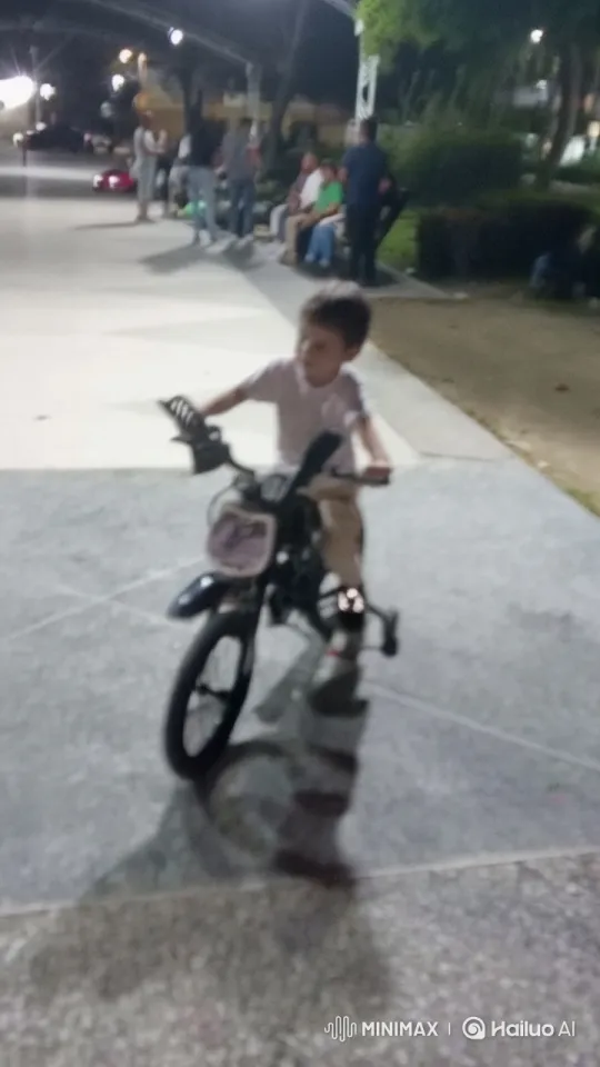 Child Rides Bicycle in Lively Night Scene – AI Generated Video | Hailuo AI