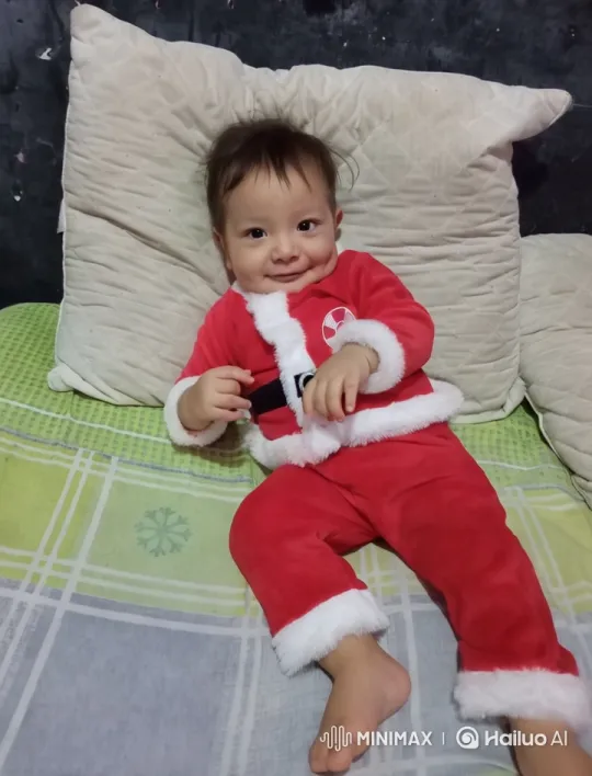 Child in Santa Suit Joyfully Dancing – AI Generated Video | Hailuo AI