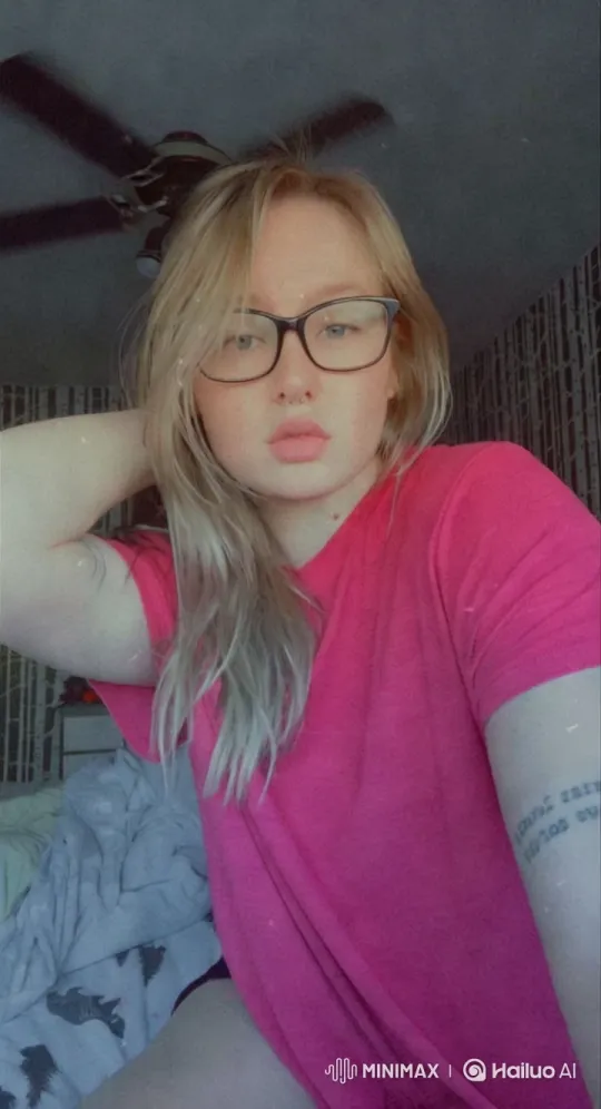 Young Woman in Cozy Room with Peace Sign – AI Generated Video | Hailuo AI