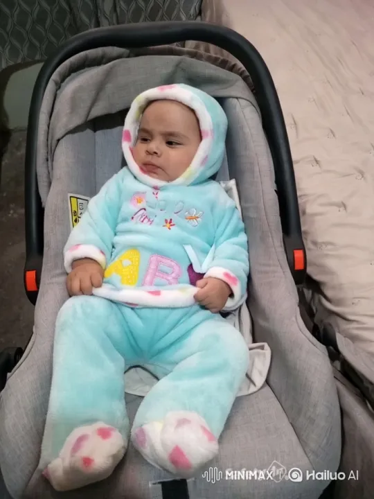 Baby in Cozy Car Seat Amidst Cozy Room Atmosphere – AI Generated Video | Hailuo AI