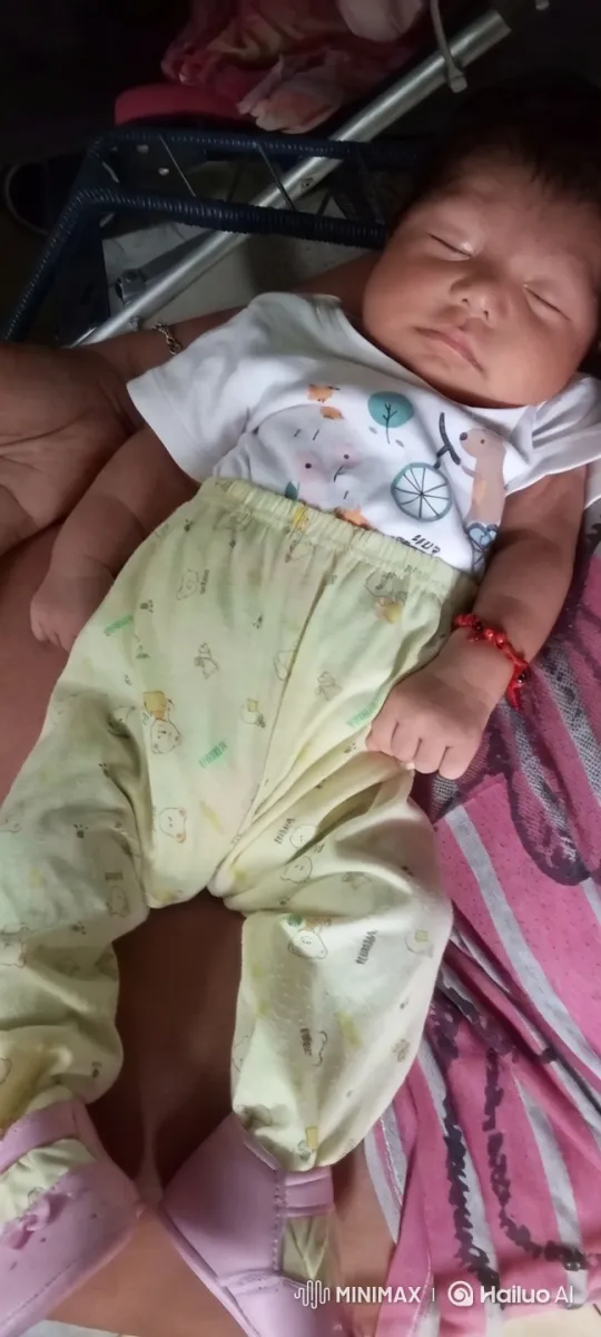 Baby Dancing Gently on Striped Blanket – AI Generated Video | Hailuo AI