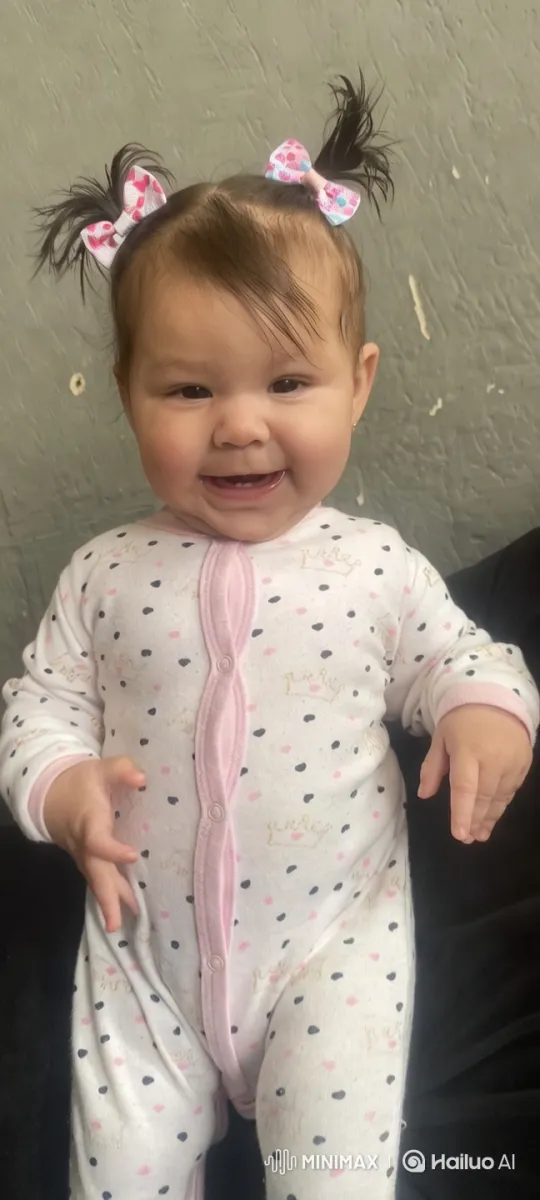 Baby in Heart Onesie with Playful Gestures – AI Generated Video | Hailuo AI
