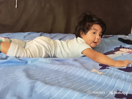 Baby's Playful Kung Fu Dance on Bed – AI Generated Video | Hailuo AI