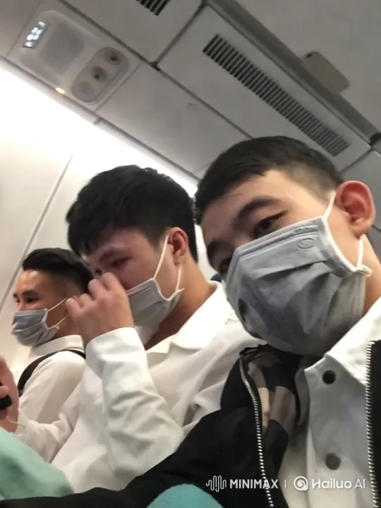 Passengers in Airplane Cabin Amidst Pandemic – AI Generated Video | Hailuo AI