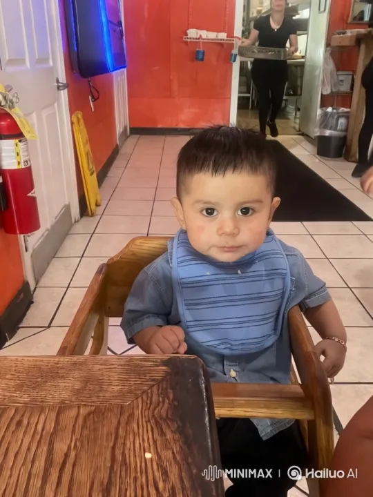 Child's Playful Actions in Restaurant Setting – AI Generated Video | Hailuo AI