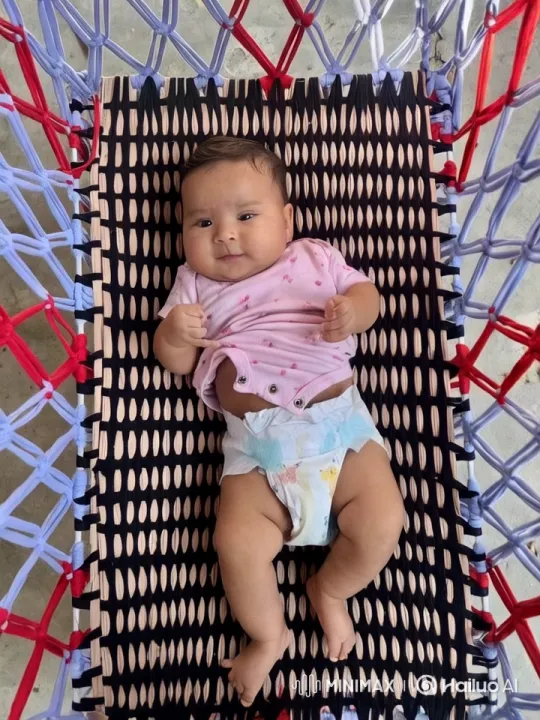 Baby Dancing in Colorful Hammock – AI Generated Video | Hailuo AI