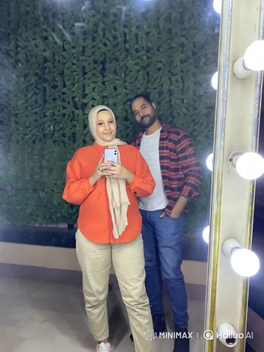 Vibrant Couple Capturing Moment in Lush Setting – AI Generated Video | Hailuo AI