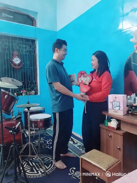 Couple Exchanging Gifts in Artistic Home Setting – AI Generated Video | Hailuo AI