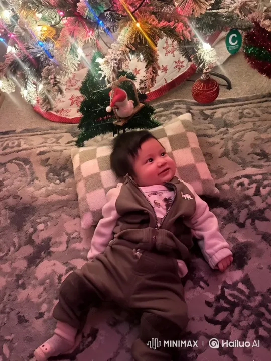 Cozy Christmas Scene with Happy Baby – AI Generated Video | Hailuo AI