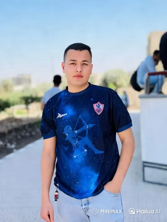 Young Man Showcases Stylish Shirt in Lively Outdoor Scene – AI Generated Video | Hailuo AI