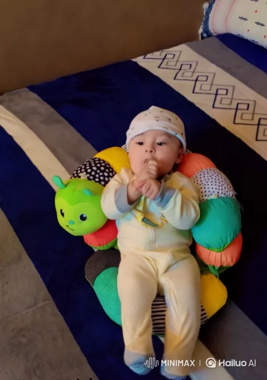 Baby Dances and Stands Up on Colorful Cushion – AI Generated Video | Hailuo AI