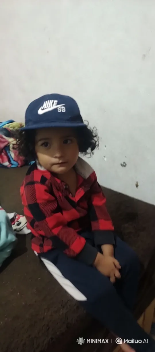 Child Dancing with Joy on Bed – AI Generated Video | Hailuo AI