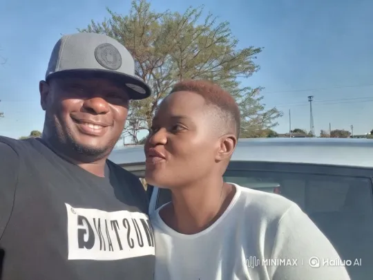 Affectionate couple sharing a kiss – AI Generated Video | Hailuo AI