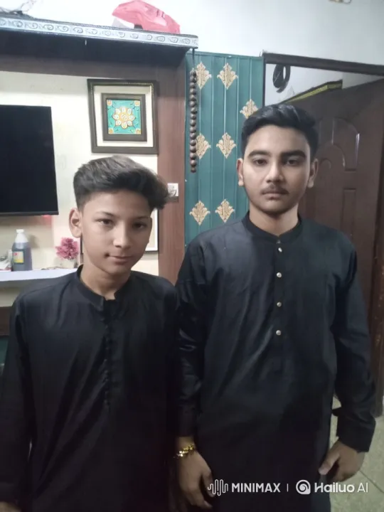 Two Individuals in Elegant Traditional Attire in a Decorative Room – AI Generated Video | Hailuo AI