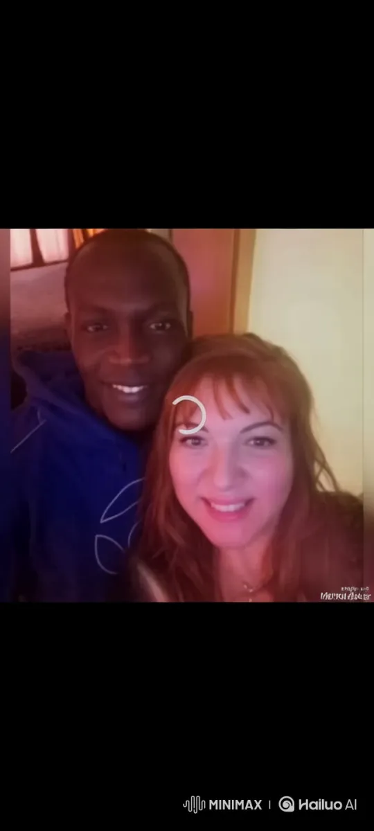 Cozy Warmth: Two Close Individuals in Blue Hoodie and Long Hair – AI Generated Video | Hailuo AI