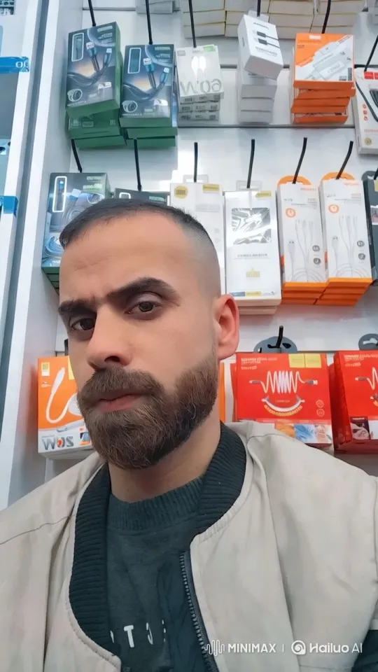 Man Waiting in Organized Electronics Store – AI Generated Video | Hailuo AI