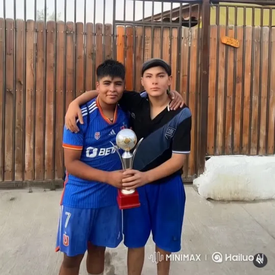 Young Soccer Players Celebrate Victory with Intimate Moment – AI Generated Video | Hailuo AI