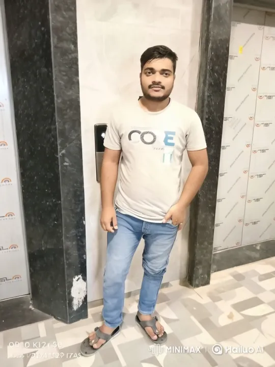 Young Man in Casual Pose in Static Setting – AI Generated Video | Hailuo AI