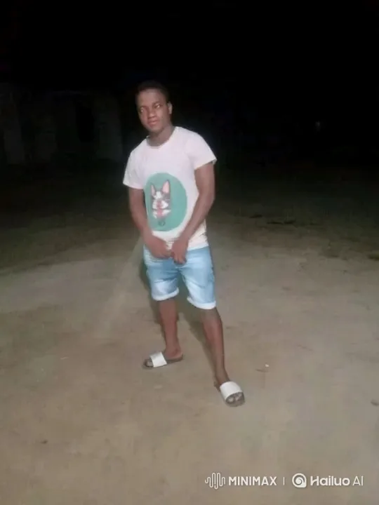 Young Man in Casual Attire Stands Out in Minimalist Scene – AI Generated Video | Hailuo AI