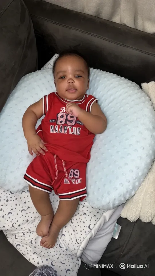 Baby's First Steps in Red Outfit with Support – AI Generated Video | Hailuo AI