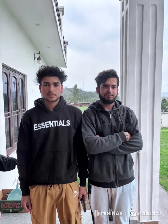 Intimate Moment Shared by Two Men on Veranda – AI Generated Video | Hailuo AI