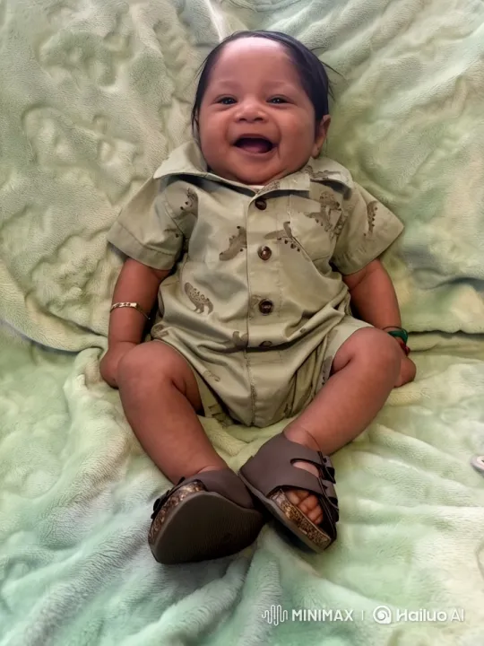 Baby's Playful Stance in Dinosaur Outfit – AI Generated Video | Hailuo AI