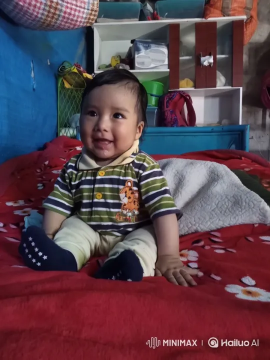 Baby Crawling on Colorful Blanket with Floral Design – AI Generated Video | Hailuo AI