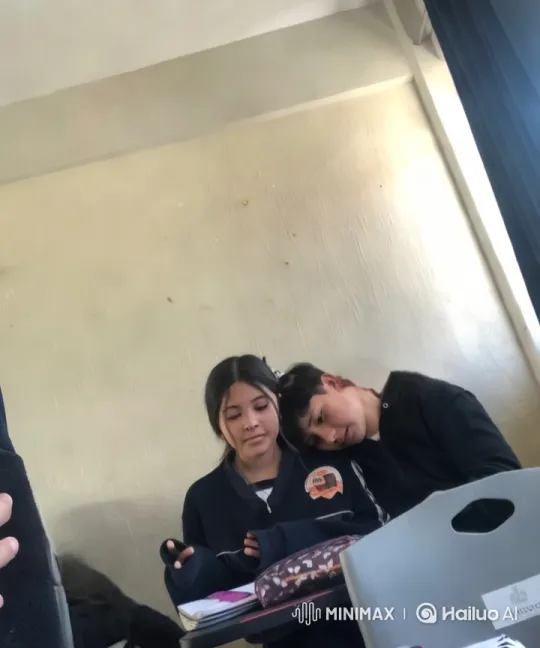 Intimate Moment Captured in Aesthetic Classroom Setting – AI Generated Video | Hailuo AI