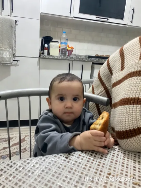 Toddler Enjoying Cake and Dancing in Kitchen – AI Generated Video | Hailuo AI