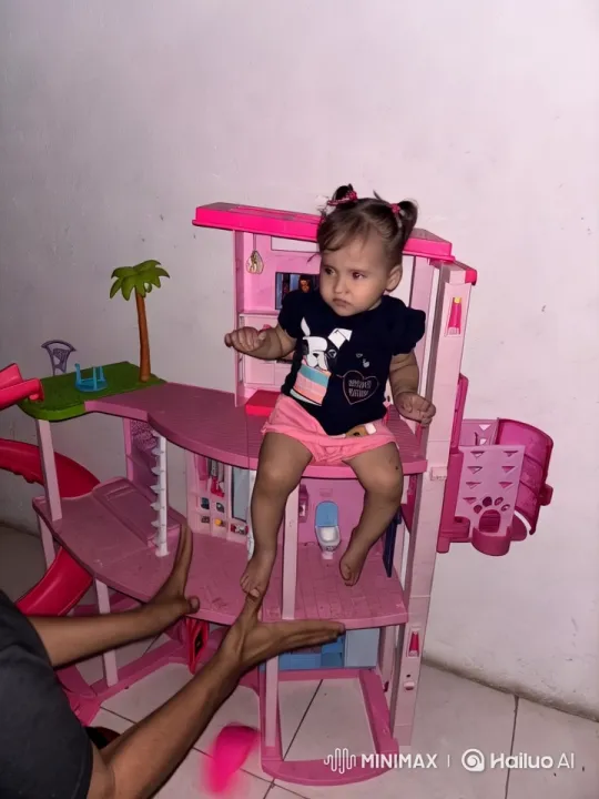 Child Dancing with Joyful Energy Near Dollhouse – AI Generated Video | Hailuo AI