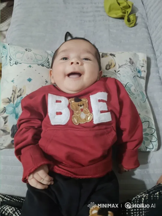 Child's Energetic Dance on Patterned Sofa – AI Generated Video | Hailuo AI