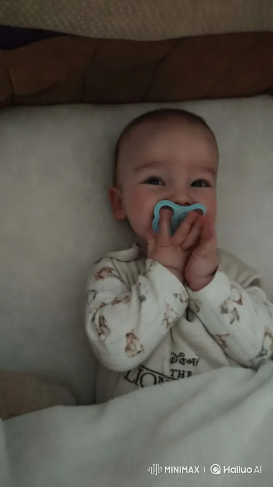 Baby Dancing Joyfully in Crib with Soft Lighting – AI Generated Video | Hailuo AI