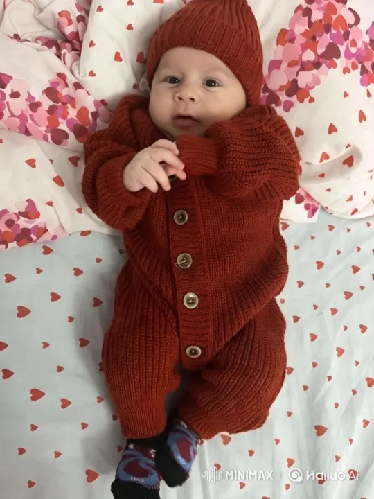 Baby's Graceful Dance in Rust Onesie with Cozy Aesthetic – AI Generated Video | Hailuo AI