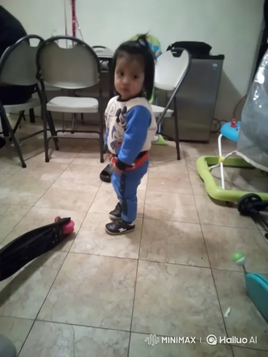 Innocent Play: Young Child Dancing in a Cluttered Room – AI Generated Video | Hailuo AI
