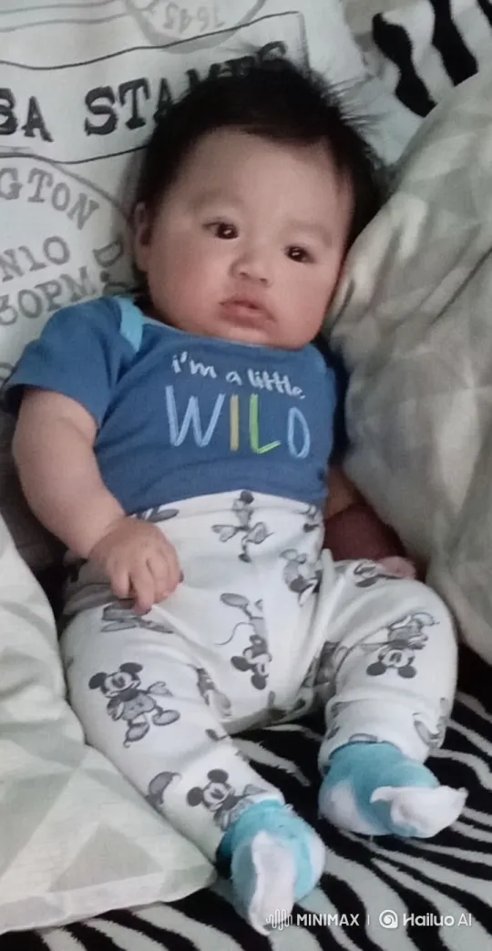 Baby Dancing in Playful Outfit on Vibrant Bed – AI Generated Video | Hailuo AI