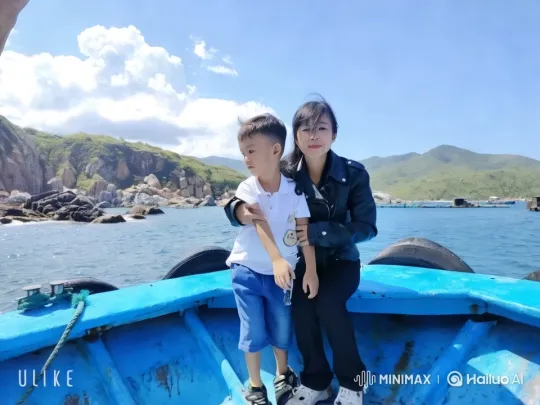 Child Practicing Kungfu on Boat Amidst Scenic Seascape – AI Generated Video | Hailuo AI