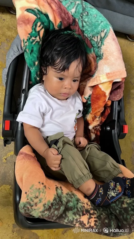 Baby's Joyful Dance in Colorful Carrier – AI Generated Video | Hailuo AI